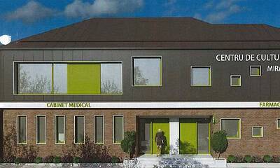 Clădire modernă a centrului cultural și de servicii din Mirăslău, cu spații pentru medicină, farmaci.