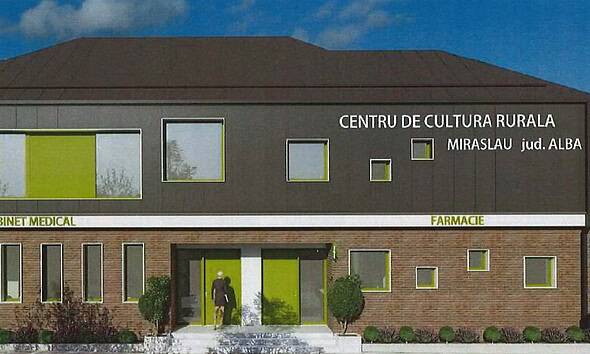 Clădire modernă a centrului cultural și de servicii din Mirăslău, cu spații pentru medicină, farmaci.
